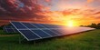 © Vergiliy - Solar panels at sunset in a green field showcasing renewable energy technology