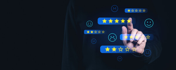Poster - Finger selecting star rating on virtual screen interface with emojis on dark background. Concept of online reviews, feedback, and performance evaluation.