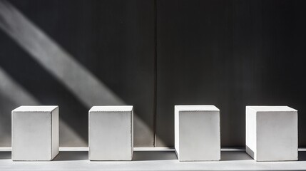 Poster - A row of simple white cubes casting sharp shadows