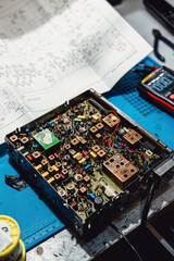 Fototapete - Lots of old printed circuit boards with radio components. Vintage printed circuit boards with solder tracks, retro style components and chips