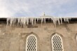 © Dr.MYM - Massive icicles hang from the edges of a building roof during the harsh winter in Erzurum, Turkey, where temperatures can drop to -50°C. A stunning natural phenomenon showcasing extreme cold weather