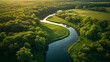 © Chimera - Aerial view of the winding river in a spring meadow at sunrise, with lush greenery and trees on both banks, creating an idyllic countryside landscape