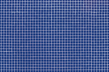 Wall Mural - Blue glass mosaic tiles on white mortar. Texture background, real photo.