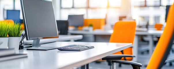 Poster - a modern office setting featuring a computer on a desk, vibrant orange chairs, and natural light ill