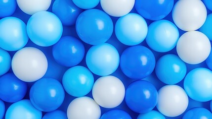 Poster - A vibrant assortment of blue and white balls arranged closely, creating a visually appealing pattern.
