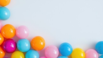 Poster - A colorful array of round balls in vibrant hues of blue, pink, orange, and yellow arranged neatly along the bottom edge of a light background.