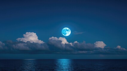 Poster - Calm Sea Under a Blue Moonlit Sky with Clouds and Space for Text or Design Elements in a Serene Night Landscape