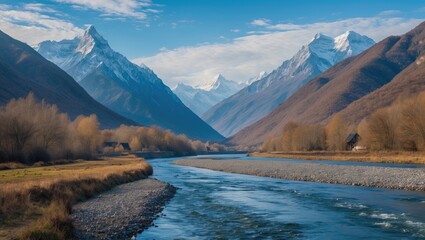 Poster - Serene Mountain Landscape with River and Autumn Foliage under Blue Sky in Golden Hour Light