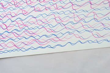 Wall Mural - calligraphic lines in pink and blue on textured paper