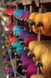 © spyrakot - Colorful Threads and Spinning Machines in Eco-Friendly Textile Production