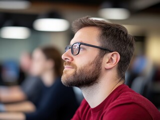 Sticker - man in thought wearing glasses in a meeting