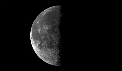 Wall Mural - Beautiful moon in one of its phases on a black background