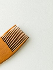 Poster - Wooden comb resting on a smooth surface in a well lit setting showcasing its natural texture and craftsmanship. Generative AI