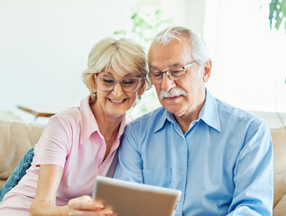 Wall Mural - woman couple senior man happy internet love tablet call video communication online internet mature a