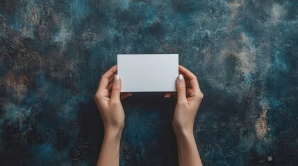 Poster - blank white card, set against a deep, textured background that makes the card stand out for graphic design.