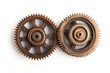 © idharmaian - Interlocking bronze gears, studio shot, white background, teamwork concept