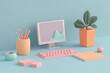 © Apisit - 3D pastel home office desk with computer, books, and stationery arranged in a neat setup.A charming workspace diorama styled in soft pink and yellow tones.