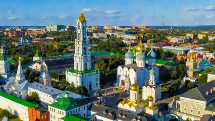 Wall Mural - Sergiev Posad, Russia. Watercolor illustration. The Trinity-Sergius Lavra is the largest male monastery of the Russian Orthodox Church with a long history. Sunset light, Aerial View