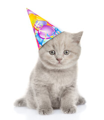 Aufkleber - Cute tiny kitten wearing party cap sitting in front view and looking at camera. isolated on white background