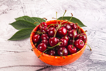 Wall Mural - Red sweet cherry in the bowl