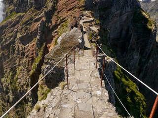 Wall Mural - Mountain trail along the steep ridges of Madeira Island