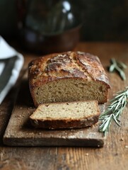 Aufkleber - Rustic loaf of bread resting on a wooden board in a cozy kitchen setting