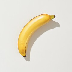 Poster - Ripe banana slice on a smooth surface showcasing vibrant yellow color and natural texture in natural lighting