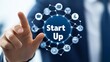 © AlfaSmart - Businessman interacting with startup icon network concept