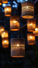 Wall Mural - A collection of woven lanterns illuminated at night, creating a warm and inviting atmosphere.