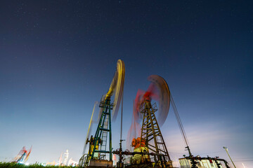 Wall Mural - In the evening, the outline of the oil pump