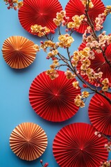 Poster - A collection of red paper fans spread out on a bright blue background