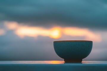 Poster - A blue bowl sits on top of a table with a simple and elegant design