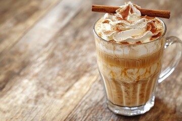 Poster - A warm cup of coffee topped with whipped cream and a cinnamon stick, perfect for a cozy morning or afternoon pick-me-up
