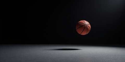 Poster - A Suspended Orange Sphere Against a Dark Background, Highlighting the Texture and Subtle Shadows Cast by a Single Source of Light