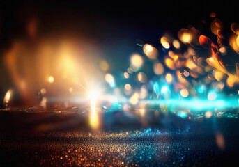 Poster - Abstract bokeh background with golden and blue lights on dark surface.