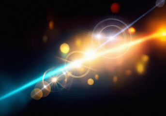 Poster - Abstract image showcasing vibrant light trails and glowing orbs against a stark black background.  The composition suggests movement and energy.
