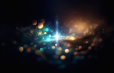 Poster - A bright white star with blue rays of light shines in the center of a black background.