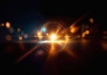 Aufkleber - Abstract image of light streaks and bokeh in a dark background