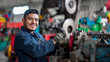 © Evodigger - Smiling worker in blue uniform,working on an industrial pipe，industry concept,banner,copy space.