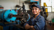 © Evodigger - Smiling worker in blue uniform,working on an industrial pipe，industry concept,banner,copy space.