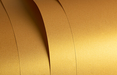 Leinwandbilder - Golden saffron paper background with a pearlescent, glossy texture and shimmering reflections. Radiant honey tones and sleek metallic sheen create an elegant, luxurious, and modern abstract design.