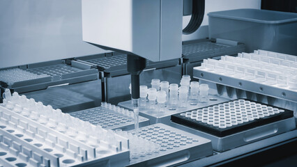 Poster - automatic machine in a medical or pharmaceutical laboratory fills ampoules with a vaccine or medicine