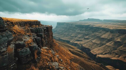 Wall Mural - Dramatic High Angle Shot of Rugged Landscape and Cloudy Sky