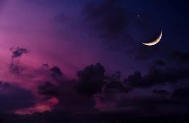 ramadan crescent moon ushering in a holy month,eid mubarak background,night sky dark purple sky,clou