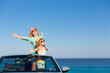 © Sunny studio - Happy family travel by car by the sea