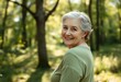© iushakovsky - Serene outdoor portrait of an 80-year-old woman