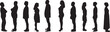 © curto - vector; silhouette of a group of people standing side view