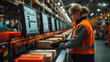 © Юлия Сергеева - Warehouse worker managing packages at a logistics center during peak hours in an organized environment
