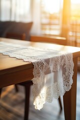 Wall Mural - Elegant lace table runner drapes over wooden table, illuminated