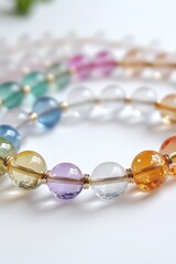 Poster - Close-up view of colorful beads intertwined on a white backdrop showcasing craftsmanship : Generative AI